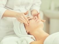 holistic facial massage with organic products
