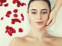 natural organic facial massage with rose petals